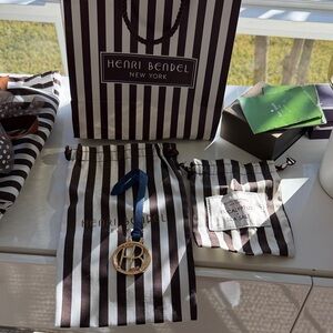 Henri Bendel Brown and White Striped Bags with Charm